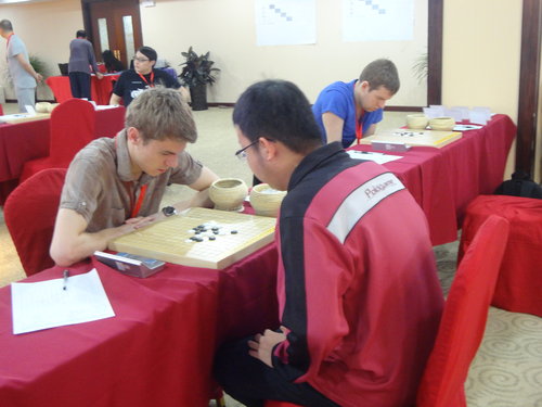 Round 8: Yang Yuxiang vs Egor Serdyukov (2012 Russian Draughts Championship Premier League bronze medalist)