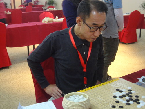 Nakamura Shigeki, a 9-dan professional Go player who has won the title of Meijin 22 times in Japan.