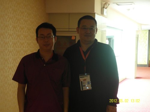 Taking a photo with famous Mainland Chinese chess player Yin Licheng.